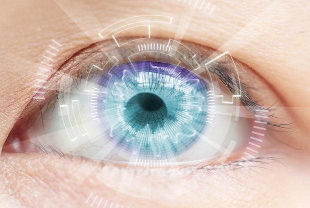 Close-up Of Woman's Blue Eye. High Technologies In The Futuristic. : Contact Lens